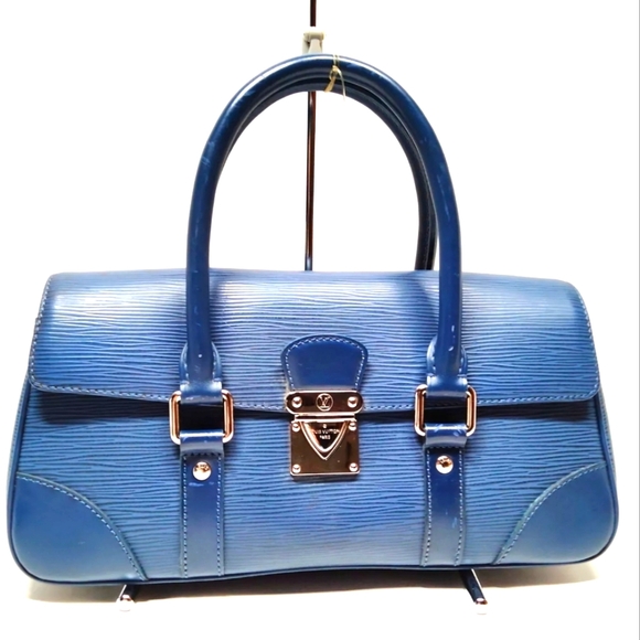 Louis Vuitton Handbags - Louis Vuitton Blue Epi Leather Pochette Segur Bag - Like New